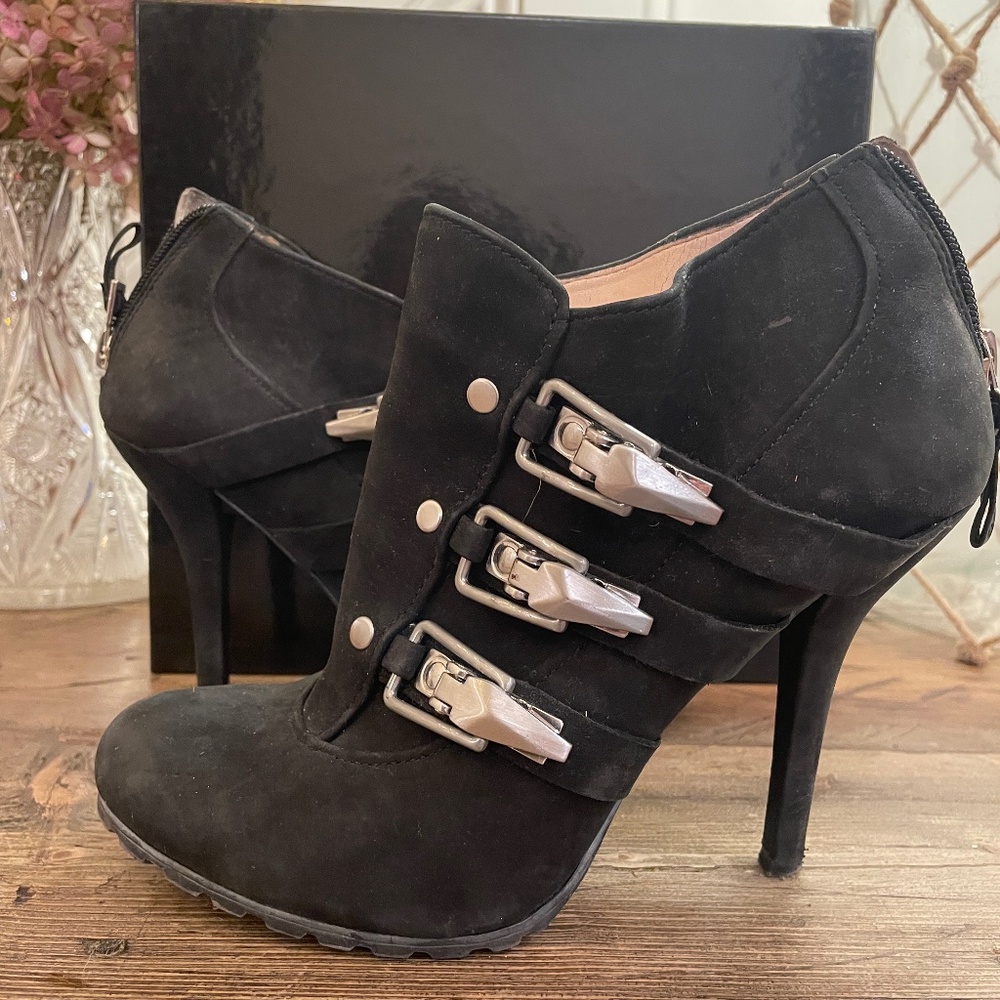 Black nubuck high-heeled booties with "ski-boot" buckles and lug sole size 7.5